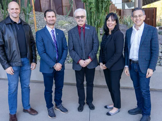 five researchers stand outside at the College of Medicine – Phoenix