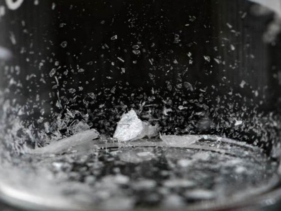 a small amount of white crystal drug representing a lethal amount of fentanyl